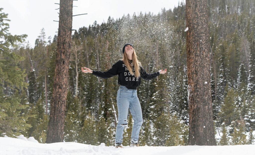 Woman enjoying the snowfall